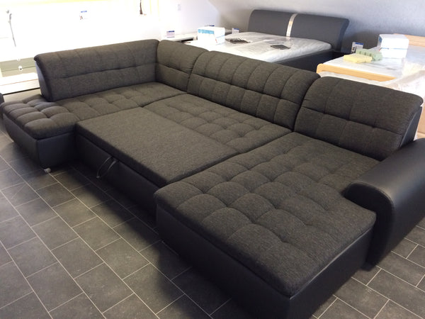 U-Shape Sectional "Edard" in Black PU Leather and Black Fabric + Bed Function/Ottoman